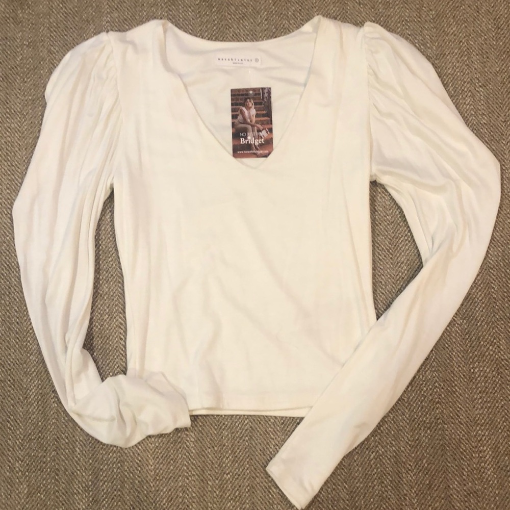 White v-neck top with ruched shoulders